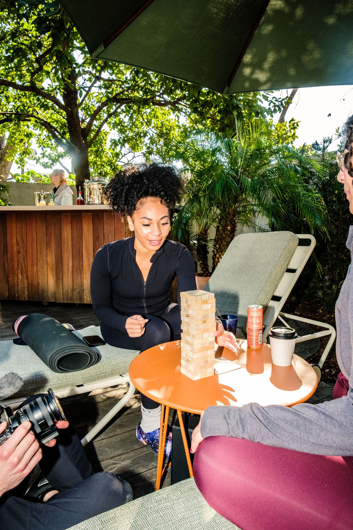 A resident playing Jenga at A Day of Vybrance