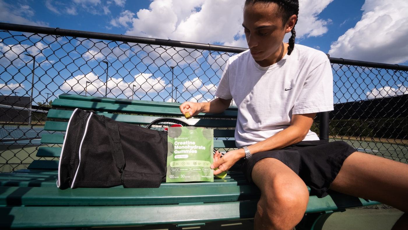 Green Apple on a courtside bench